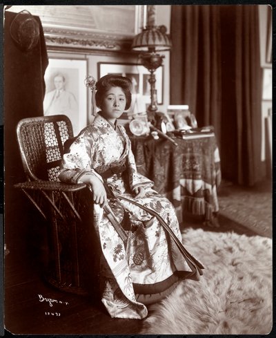 An Asian Female Fashion Model Wearing a Kimono at the Strauss Studio, New York, 1903 by Byron Company